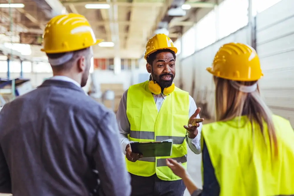 Construction workers wearing PPE on a construction site