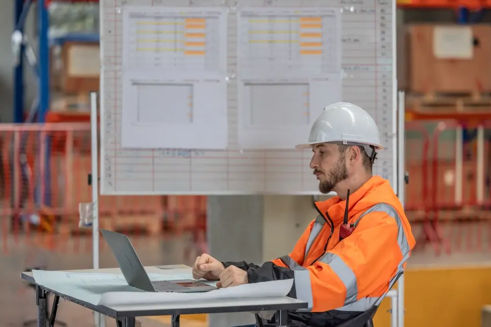 Construction worker comparing low-cost OSHA 30 Construction course prices.